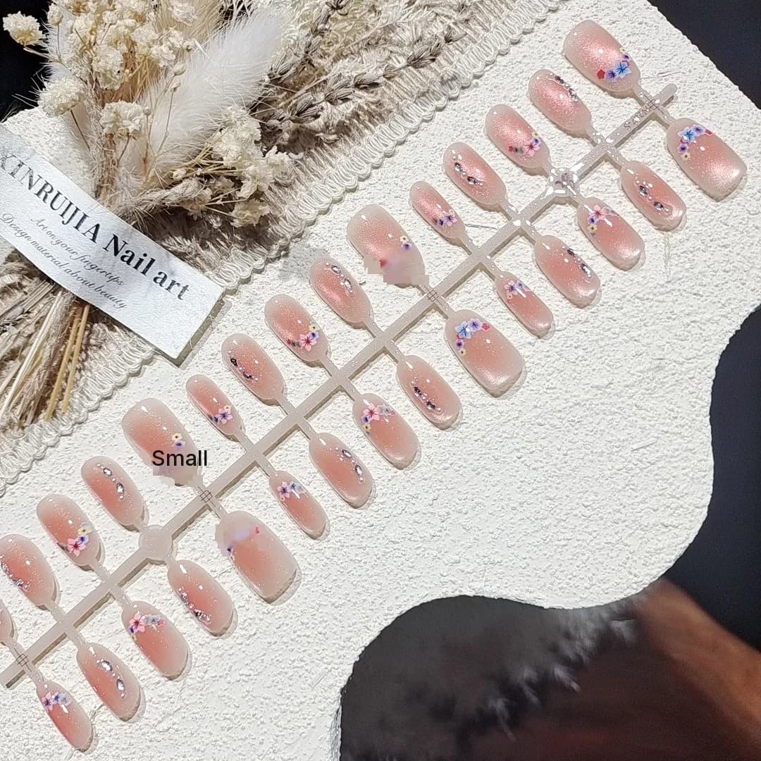 Kirsikõie kassisilma kunstküüned rhinestonetega